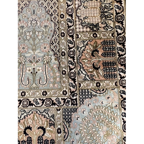 95 - GARDEN DESIGN SILK RUG, 220cm x 155cm.