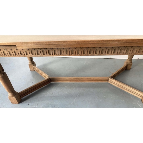 101 - DRAW LEAF EXTENDING DINING TABLE, early 20th century oak, rectangular cleated stretched supports and... 