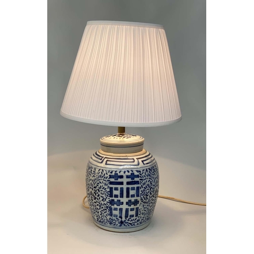 106 - TABLE LAMPS, a pair Chinese ceramic blue and white lidded jar form, geometric panels with shades, 60... 