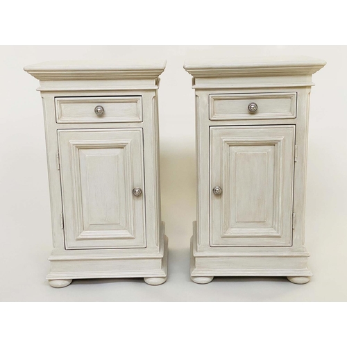 111 - BEDSIDE CABINETS, a pair French style traditionally grey painted each with drawer and panelled door,... 