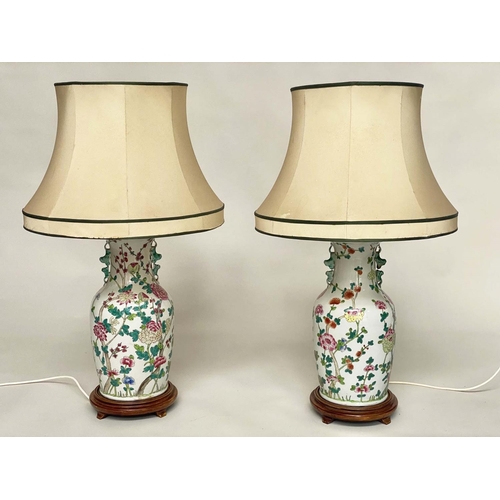 115 - TABLE LAMPS, a large pair Chinese ceramic famille verte of vase form with shades, 85cm H. (2)