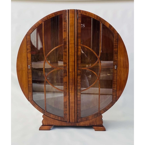 125 - ART DECO DISPLAY CABINET, Art Deco period figured walnut of circular form with two astragal glazed d... 