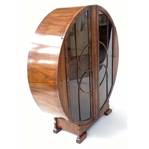 125 - ART DECO DISPLAY CABINET, Art Deco period figured walnut of circular form with two astragal glazed d... 