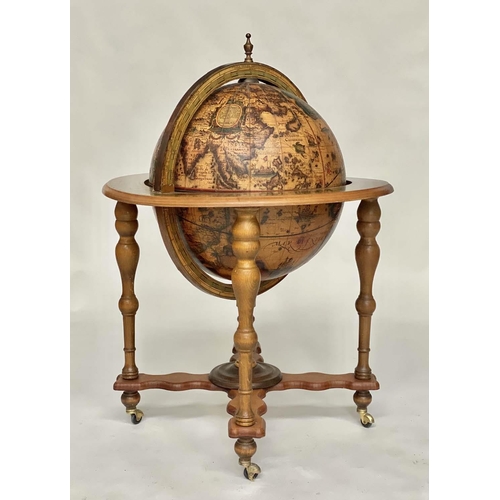 127 - GLOBE COCKTAIL CABINET, in the form of an antique terrestrial globe on stand with rising 'lid' and f... 