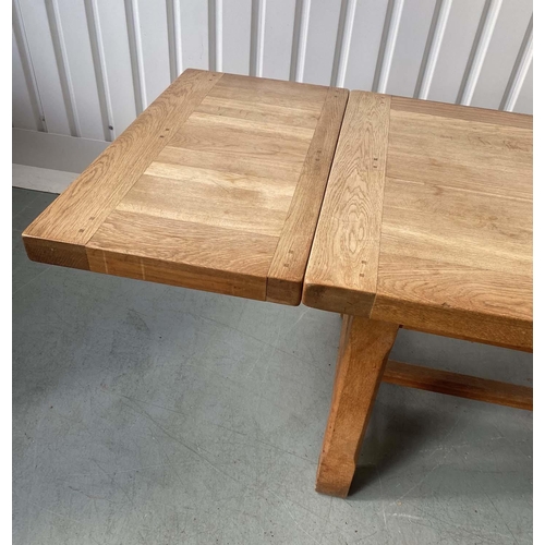 130 - EXTENDING OAK REFECTORY DINING TABLE, solid oak parquetry panelled with substantial chamfered suppor... 