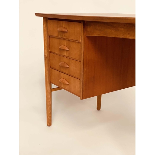 310 - DANISH DESK, 1970s Danish teak with bank of four drawers and turned tapering supports, 102cm W x 57c... 