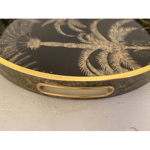 359 - COCKTAIL TRAYS, a pair, 36cm diameter, 1950s Italian style, palm tree print. (2)