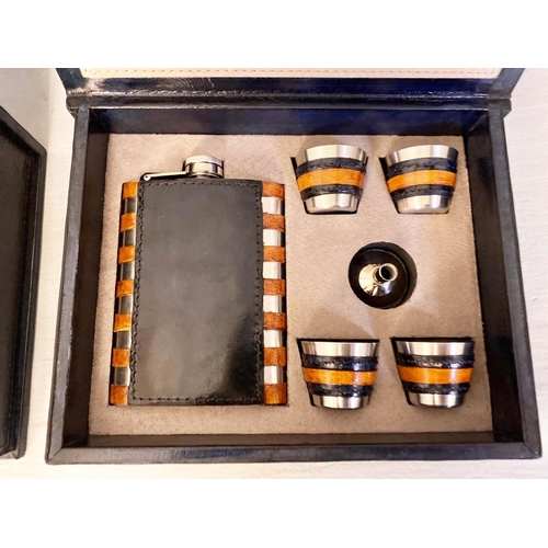 360 - WHISKEY TRAVELLING SET, a pair, each including a hip flask, 4 shot glasses, and a funnel, in boxes, ... 