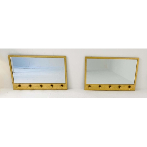 366 - HOUSEKEEPERS MIRRORS, a pair, 42cm H x 66cm W, fitted with five coat hooks. (2)