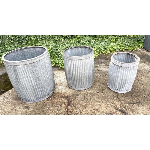 387 - TUB PLANTERS, graduated set of three, largest 50cm H x 45cm D, galvanised zinc. (2)