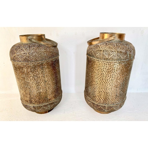 391 - STORM LANTERNS, pair, 70cm H x 35cm D, of Oriental style, pierced gilt metal bodies.