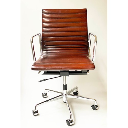 173 - REVOLVING DESK CHAIR, Charles and Ray Eames inspired with ribbed mid brown tan leather seat revolvin... 