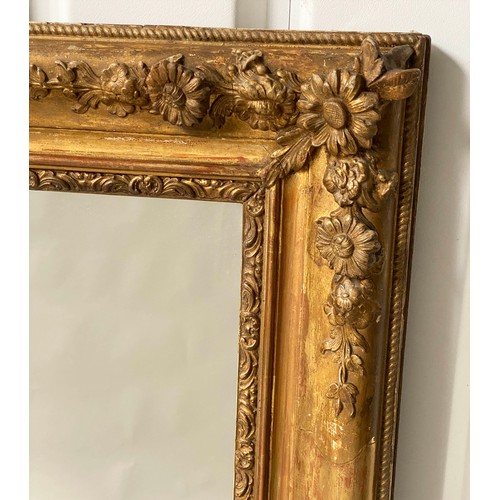 251 - OVERMANTEL MIRROR, 19th century French giltwood and gesso moulded, rectangular frame with floral det... 