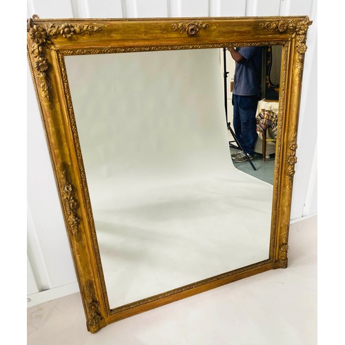 251 - OVERMANTEL MIRROR, 19th century French giltwood and gesso moulded, rectangular frame with floral det... 