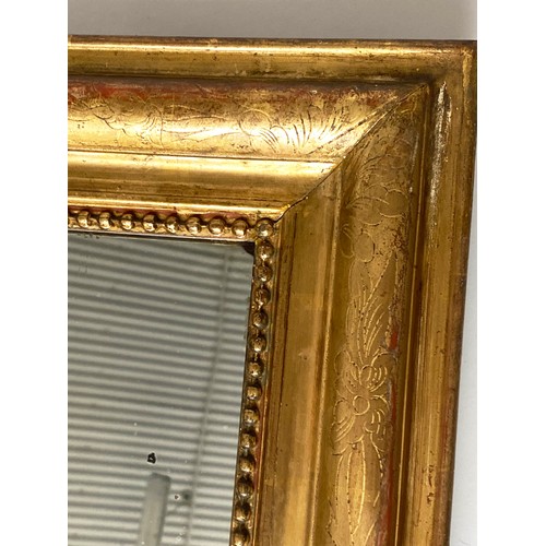 122 - OVERMANTEL MIRROR, 19th century French giltwood and gesso moulded with rectangular beaded frame, 107... 