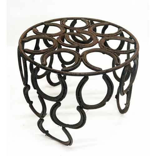 267 - 'HORSESHOE' GARDEN ARMCHAIR AND TABLE, constructed from welded iron horseshoes, chair 110cm H x 41cm... 