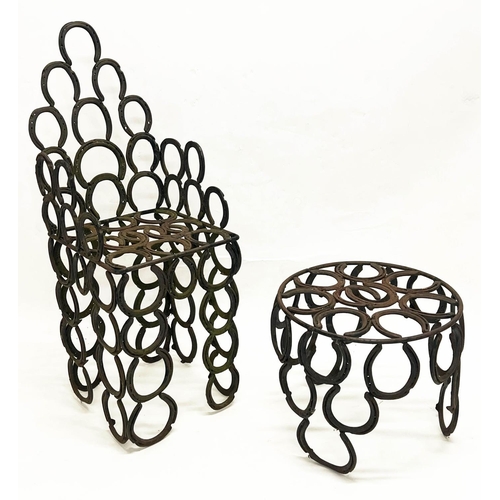 267 - 'HORSESHOE' GARDEN ARMCHAIR AND TABLE, constructed from welded iron horseshoes, chair 110cm H x 41cm... 