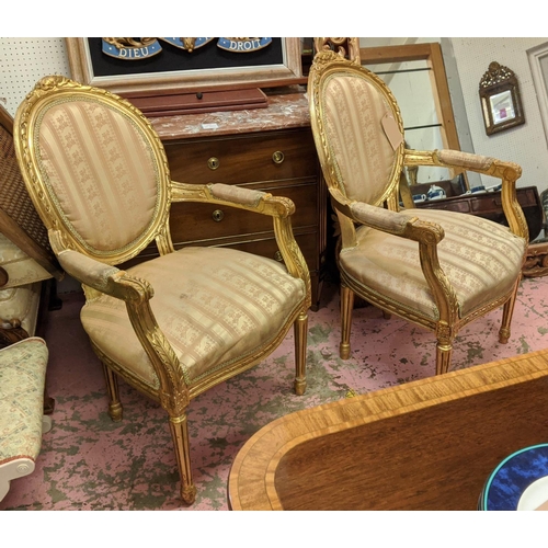 289 - FAUTEUILS, a pair, each 65cm W x 107cm H, Louis XVI style giltwood. (2)