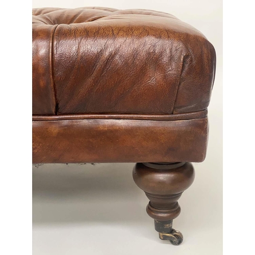 101 - CENTRE/HEARTH STOOL, rectangular deep buttoned upholstered mid brown leather with turned brass cappe... 