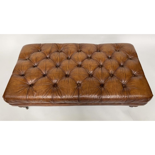 101 - CENTRE/HEARTH STOOL, rectangular deep buttoned upholstered mid brown leather with turned brass cappe... 