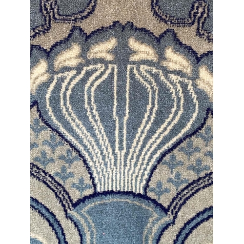 122 - ARMCHAIR, early 20th century with blue and green Art Deco pattern carpet weave upholstery, 84cm W.