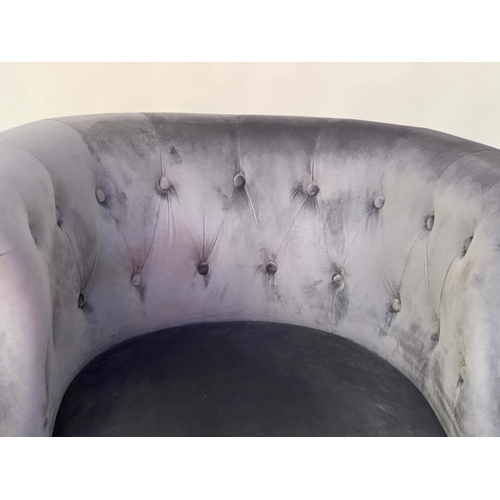 127 - TUB ARMCHAIR, Edwardian style grey velvet with rounded deep button upholstered arms and turned suppo... 