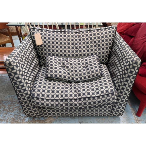 449 - ARMCHAIR, possibly cuddler range, black and grey patterned upholstery leather piping, feather filled... 