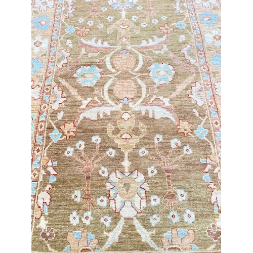 82 - FEREGHAN DESIGN CORRIDOR CARPET, 419cm x 123cm.