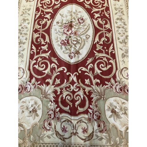 83 - AUBUSSON RUG, 250cm x 155cm.