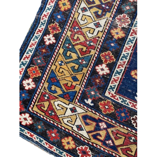 84 - ANTIQUE CAUCASIAN SHIRVAN RUG, 190cm x 120cm.