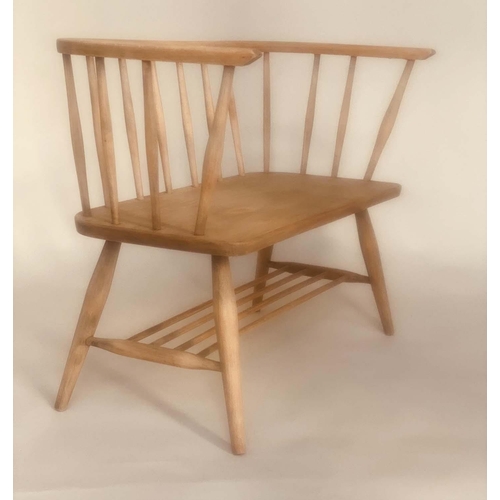 91 - ERCOL STYLE HALL SEAT, mid 20th century elm, with enclosing rail back and solid seat in the manner o... 