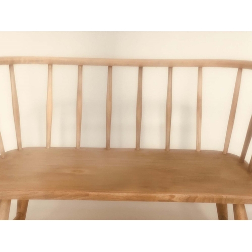 91 - ERCOL STYLE HALL SEAT, mid 20th century elm, with enclosing rail back and solid seat in the manner o... 