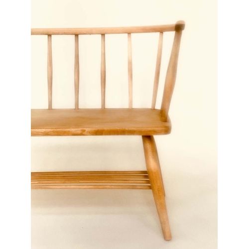 91 - ERCOL STYLE HALL SEAT, mid 20th century elm, with enclosing rail back and solid seat in the manner o... 