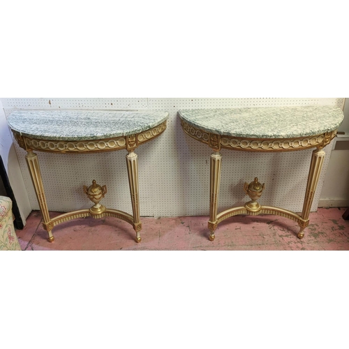 228 - DEMI LUNE CONSOLE TABLES, a pair, each 100cm x 82cm H x 44cm, Louis XVI style. cream painted and gil... 