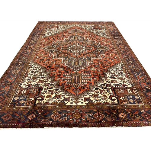 102 - PERSIAN HERIZ CARPET, 335cm x 235cm.