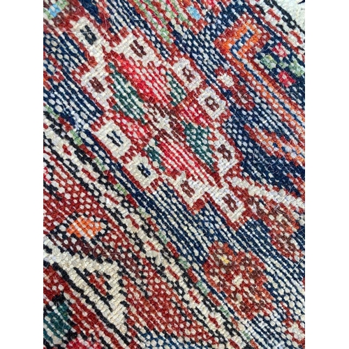 113 - ANTIQUE HERIZ RUNNER, 340cm x 86cm.