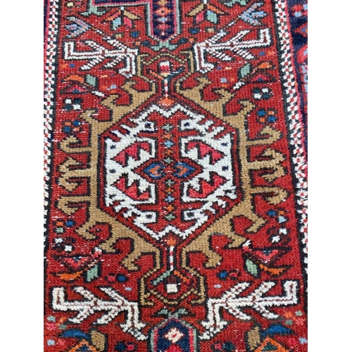 113 - ANTIQUE HERIZ RUNNER, 340cm x 86cm.