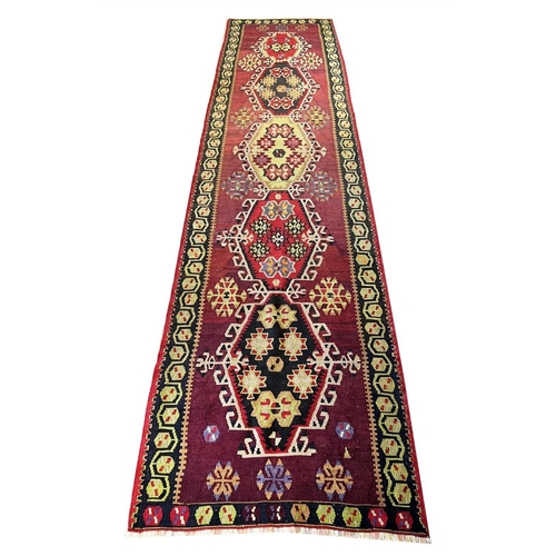 128 - KILIM RUNNER, 320cm x 78cm.