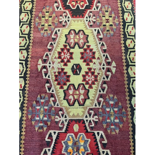 128 - KILIM RUNNER, 320cm x 78cm.