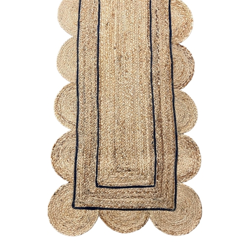 129 - SCALLOPED EDGE JUTE RUNNER, 370cm x 64cm.