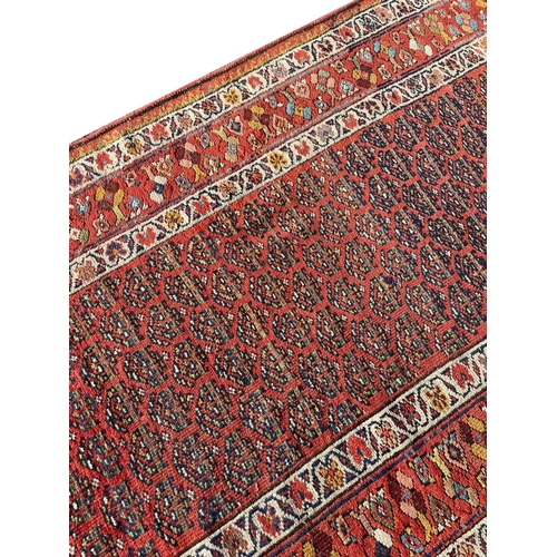 131 - ANTIQUE KURDISH RUNNER, 290cm x 111cm.