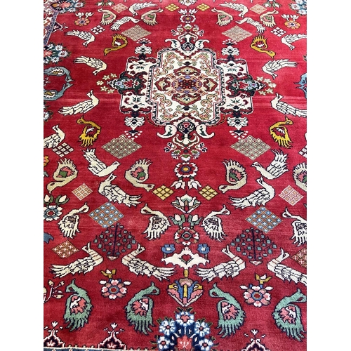 135 - PERSIAN BAKHTIARI CARPET, 295cm x 215cm, hand knotted wool.