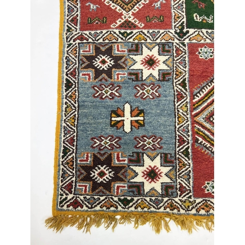 136 - MOROCCAN RUG, 215cm x 111cm, vintage hand knotted wool.