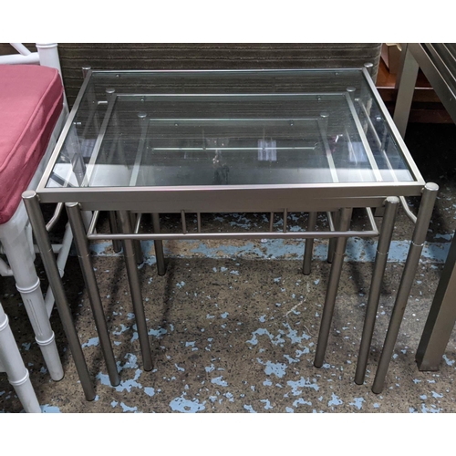 267 - NESTING TABLES, a set of three, metal and glass, 59cm x 45cm x 50cm. (3)