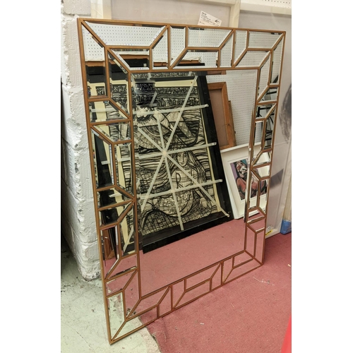 272 - WALL MIRROR, 1970s Italian style, gilt and segmented plate frame, 118cm x 89cm.