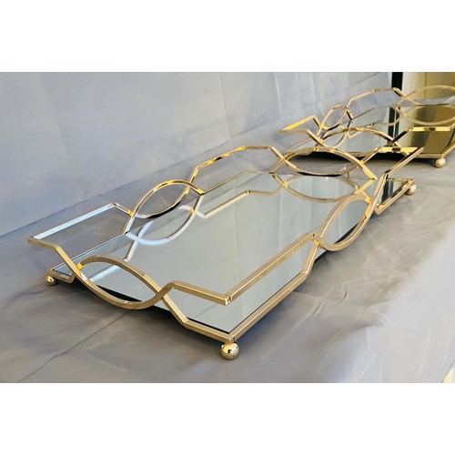 294 - COCKTAIL TRAYS, a pair, 7cm H x 45cm W x 30cm D, mirrored glass and gilt metal. (2)