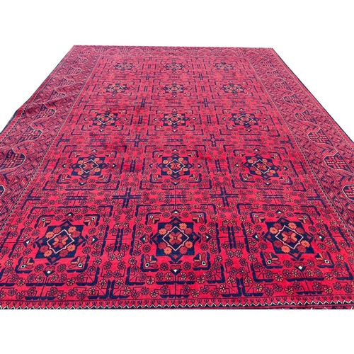 114 - AFGHAN CARPET, 290cm x 198cm.