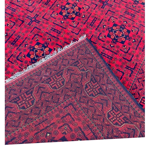 114 - AFGHAN CARPET, 290cm x 198cm.