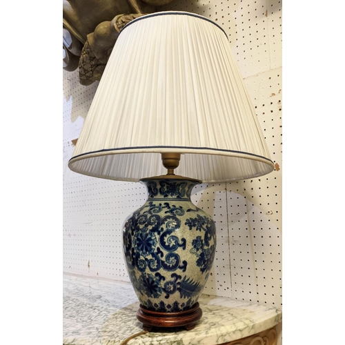 420 - TABLE LAMPS, a pair, blue and white each overall 61cm tall including shades and one other with a gil... 