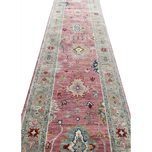 147 - CONTEMPORARY OUSHAK RUNNER, 480cm x 80cm.